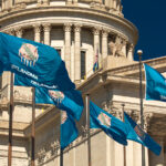 Medical Marijuana is Good Enough for Most Oklahoma Voters OCTOBER 11, 2018 Oklahma City USA -State Flag flies over Oklahoma State Capitol, Oklahoma City OK