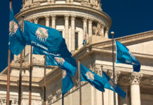 Medical Marijuana is Good Enough for Most Oklahoma Voters OCTOBER 11, 2018 Oklahma City USA -State Flag flies over Oklahoma State Capitol, Oklahoma City OK