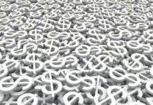 Payroll Shakeup: Be Aware of Pitfalls, but Don’t Panic. Money background of dollars. 3d