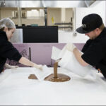 The BIG ZEN Giant 4,200,000mg Chocolate Bar Photo Gallery pouring the world's biggest cannabis-infused chocolate bar