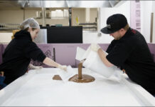 The BIG ZEN Giant 4,200,000mg Chocolate Bar Photo Gallery pouring the world's biggest cannabis-infused chocolate bar