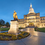 Former MI House Speaker Pleads Guilty in Cannabis Bribery Scheme Lansing, Michigan, USA at the Michigan State Capitol during the evening. (Governor Austin Blair statue dedicated in 1898)