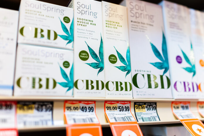 Herndon, USA - May 7, 2020: Inside Sprouts farmers market grocery store shop with retail display of SoulSpring CBD cannabidiol oil infused botanical products, muscle rub spray and roll-on