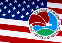 DEA Reports More Seizures, Fewer Arrests in 2022 The seal or symbol of the Drug Enforcement Administration DEA of the U.S. Justice Department, portrayed with the USA flag