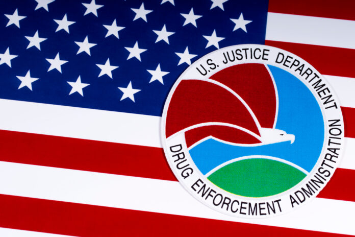 The seal or symbol of the Drug Enforcement Administration DEA of the U.S. Justice Department, portrayed with the USA flag
