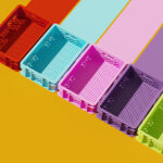 6 Loyalty Programs for a Lasting Retail Advantage Minimal composition for business, shipping and storage concept. Colorful plastic crate container on yellow background. 3d rendering illustration.