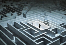 How to Land the Best Insurance Deal Businessman stand in front of maze entrance. Business problem solving, making decision, finding solution and challenge concept.