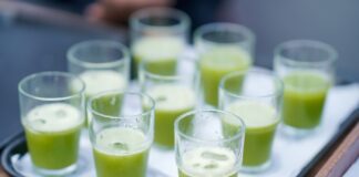 How Free Samples Trigger Curiosity and Drive Brand Loyalty GREEN COLOR AVOCADO SMOOTHIE JUICE HALF GLASS FULL ON A TRAY