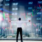 Cannabis Executive Salaries Are Soaring into 2024 Businessman standing keeping arms raised and Businessman looking to stock market graph Success concept