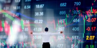 Cannabis Executive Salaries Are Soaring into 2024 Businessman standing keeping arms raised and Businessman looking to stock market graph Success concept