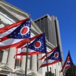 Ohio Republicans Vow to Undermine Will of Voters State of Ohio flags waving in front of the Statehouse in Columbus, OH
