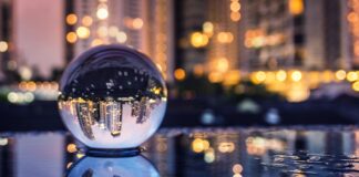 Ten Years of Tenacity and Innovation Night city in the glass ball