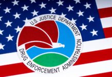 DEA Confirms Rescheduling Review DEA logo on american flag