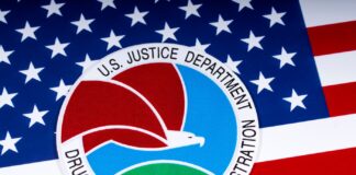 DEA Confirms Rescheduling Review DEA logo on american flag