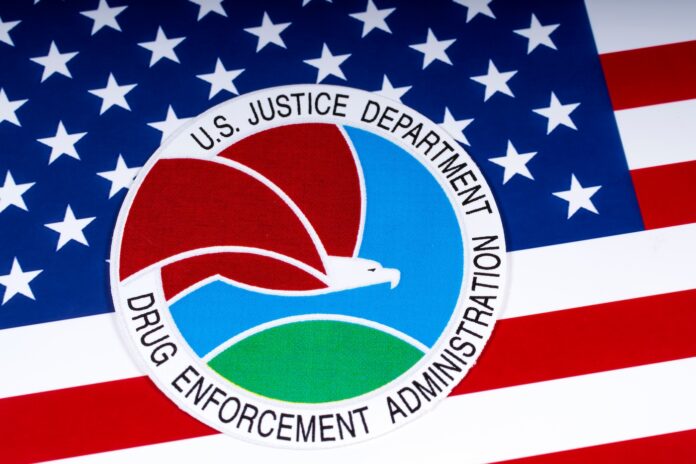 DEA logo on american flag