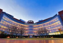 DOJ Asks Federal Court to Dismiss Lawsuit Calling CSA ‘Unconstitutional’ Boston, Massachusetts - December 28, 2019: John Joseph Moakley United States Courthouse at sunrise. The courthouse is located on Fan Pier on the Boston, Massachusetts waterfront.