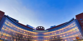 DOJ Asks Federal Court to Dismiss Lawsuit Calling CSA ‘Unconstitutional’ Boston, Massachusetts - December 28, 2019: John Joseph Moakley United States Courthouse at sunrise. The courthouse is located on Fan Pier on the Boston, Massachusetts waterfront.