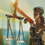 DPA: Rescheduling Is a Half-Step ‘Our Communities Cannot Accept’ Lady Justice Statue