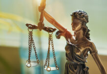 DPA: Rescheduling Is a Half-Step ‘Our Communities Cannot Accept’ Lady Justice Statue