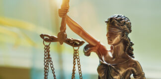 DPA: Rescheduling Is a Half-Step ‘Our Communities Cannot Accept’ Lady Justice Statue