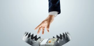 Delinquent Payments Topped $3.8 Billion in 2023 business man struggling to collect money from a trap