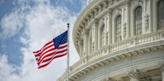 Is Rescheduling Imminent? Washington,Dc,Capitol,Dome,Detail,With,Waving,American,Flag