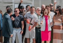 Green Horizons Cultivation Facility Ribbon-Cutting Ceremony Green Horizons CEO Los Arias Cuts The Ribbon with Fiona Ma