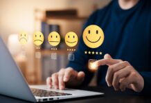 Survey Shows Gen Z Likes Smoking Cannabis More than Drinking Alcohol man in blue sweater pointing to happy face with 5-star review online