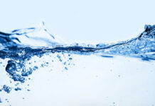 The Critical Role of Water Activity Water and air bubbles over white background