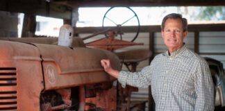 Fife Symington IV’s High Stakes in the High Country J Fife Symington IV with tractor by Carl Schultz Shultz Digital mg Magazine