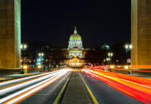 Pennsylvania’s Rec Market Could Generate $2.8 Billion in First Year Pennsylvania state capitol at night with car lights streaking through with open camera shutter