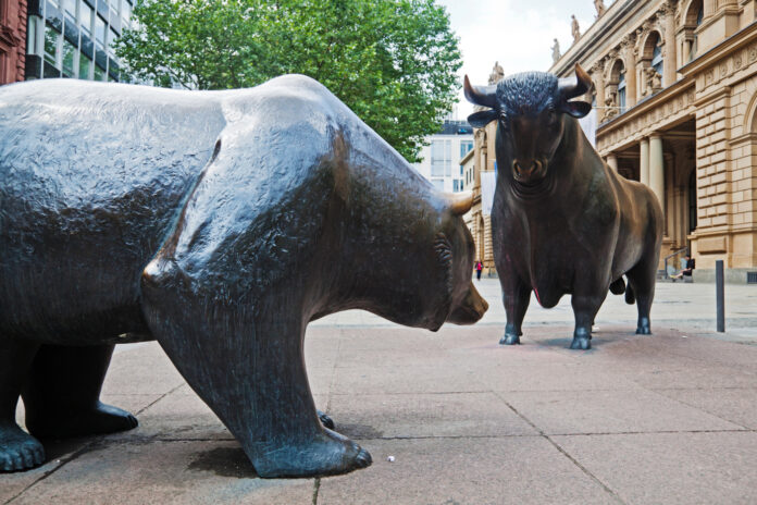 NYSE Bull and Bear by Madrabothair mg Magazine