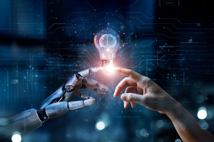 AI robot hand with pointed finger touching a human hand with pointed finger with a brain in between