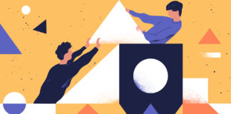 5 Keys for Successful Marketing Partnerships two people working together to build a geometric structure demonstrating teamwork in partnership.