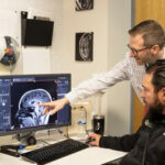 Study: Cannabis Impacts Working Memory Dr. Josh Gowin looking at a brain scan.