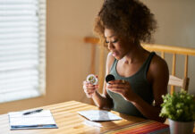 How Cannabis Brands Can Win Women’s Trust woman-reviewing-cannabis-product-trust