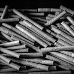 Large batch of cannabis pre-rolls highlighting mass production and consumer demand for affordable, convenient, and potent products in today’s pre-roll market.