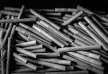 Roll with It: Pre-Roll Market Heats Up Large batch of cannabis pre-rolls highlighting mass production and consumer demand for affordable, convenient, and potent products in today’s pre-roll market.
