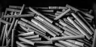 Roll with It: Pre-Roll Market Heats Up Large batch of cannabis pre-rolls highlighting mass production and consumer demand for affordable, convenient, and potent products in today’s pre-roll market.