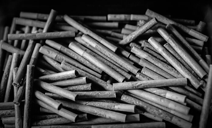 Large batch of cannabis pre-rolls highlighting mass production and consumer demand for affordable, convenient, and potent products in today’s pre-roll market.