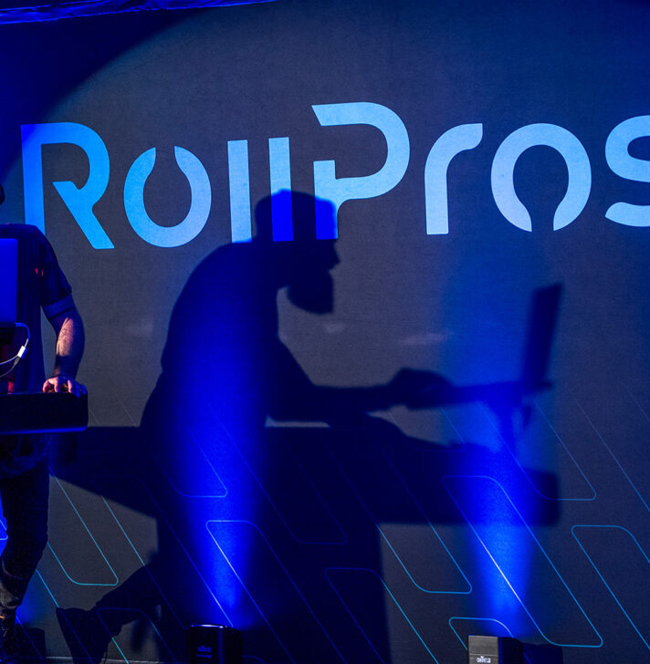DJ performs at RollPros Blackbird XXL launch event with brand logo backdrop