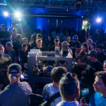 RollPros Blackbird XXL Launch Event Attendees watch live demo of RollPros Blackbird XXL blunt-rolling machine