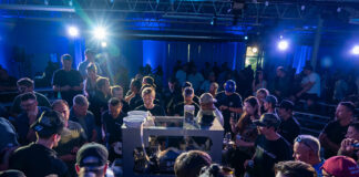 RollPros Blackbird XXL Launch Event Attendees watch live demo of RollPros Blackbird XXL blunt-rolling machine