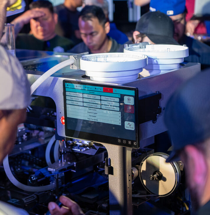 Close-up of RollPros Blackbird XXL touchscreen controls during blunt machine demo