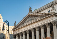 NY Supreme Court Blocks OCM from Closing Licensed Dispensaries New York State Supreme Court building in Manhattan with inscription emphasizing justice, related to injunction blocking OCM dispensary closures.