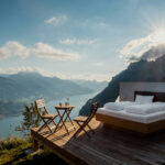 CBN: The Cannabinoid Redefining Natural Sleep Solutions Scenic outdoor bedroom overlooking mountain lake at sunrise, symbolizing natural and holistic sleep environments inspired by wellness practices.
