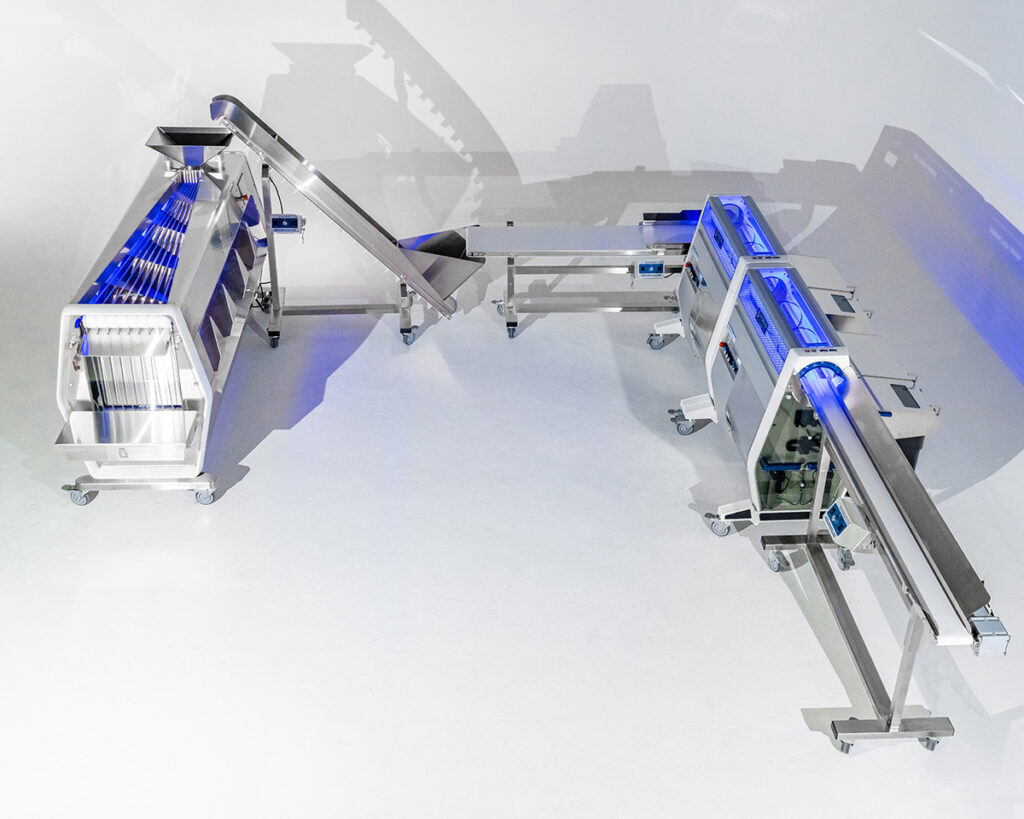 Mobius post-harvest automation line in U-configuration, featuring trimmers and conveyors for streamlined cannabis processing.