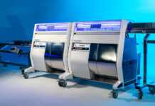 Mobius: Automation that Pays for Itself, Maximizing ROI Two Mobius M108S Trimmers in tandem configuration with conveyor system, designed for high-volume cannabis post-harvest automation.