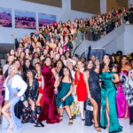 Women-Led Blunt Brunch is Redefining Cannabis Networking Hundreds of women in formal attire gathered on a staircase at a Blunt Brunch event, showcasing the scale, diversity, and vibrant community of women in cannabis.