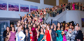 Women-Led Blunt Brunch is Redefining Cannabis Networking Hundreds of women in formal attire gathered on a staircase at a Blunt Brunch event, showcasing the scale, diversity, and vibrant community of women in cannabis.